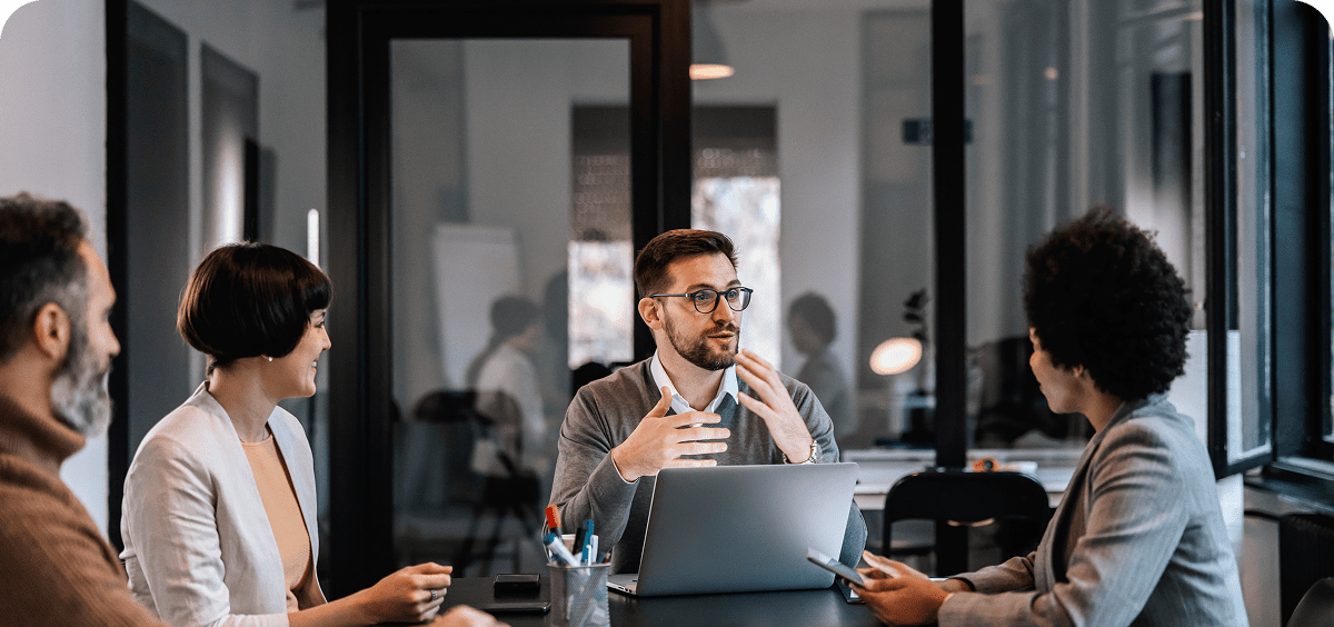 Colleagues collaborating in conference room