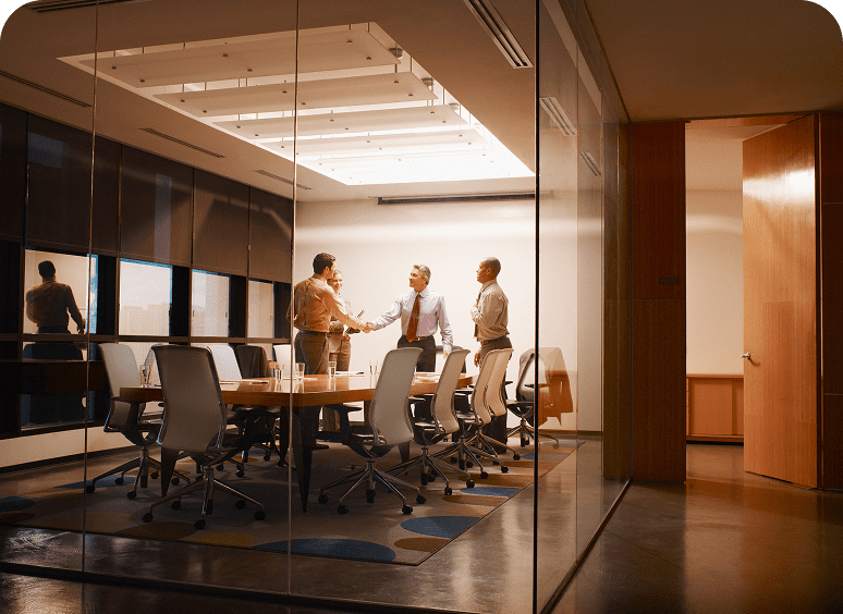 Team discussing around conference table